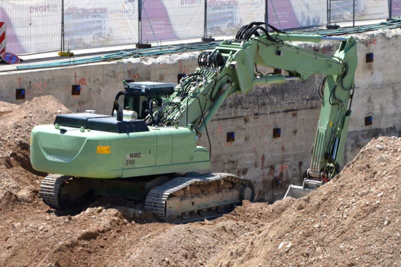 excavators-1534678_1920_R